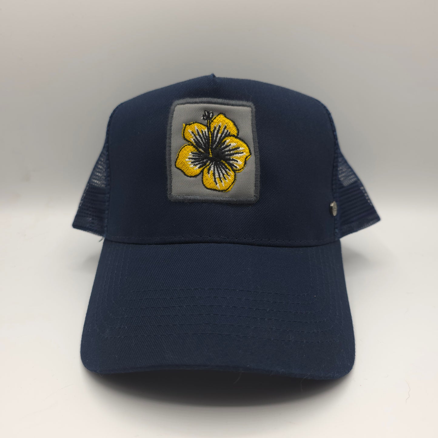 GORRA TRUCKER AZUL MARINO HIBISCO