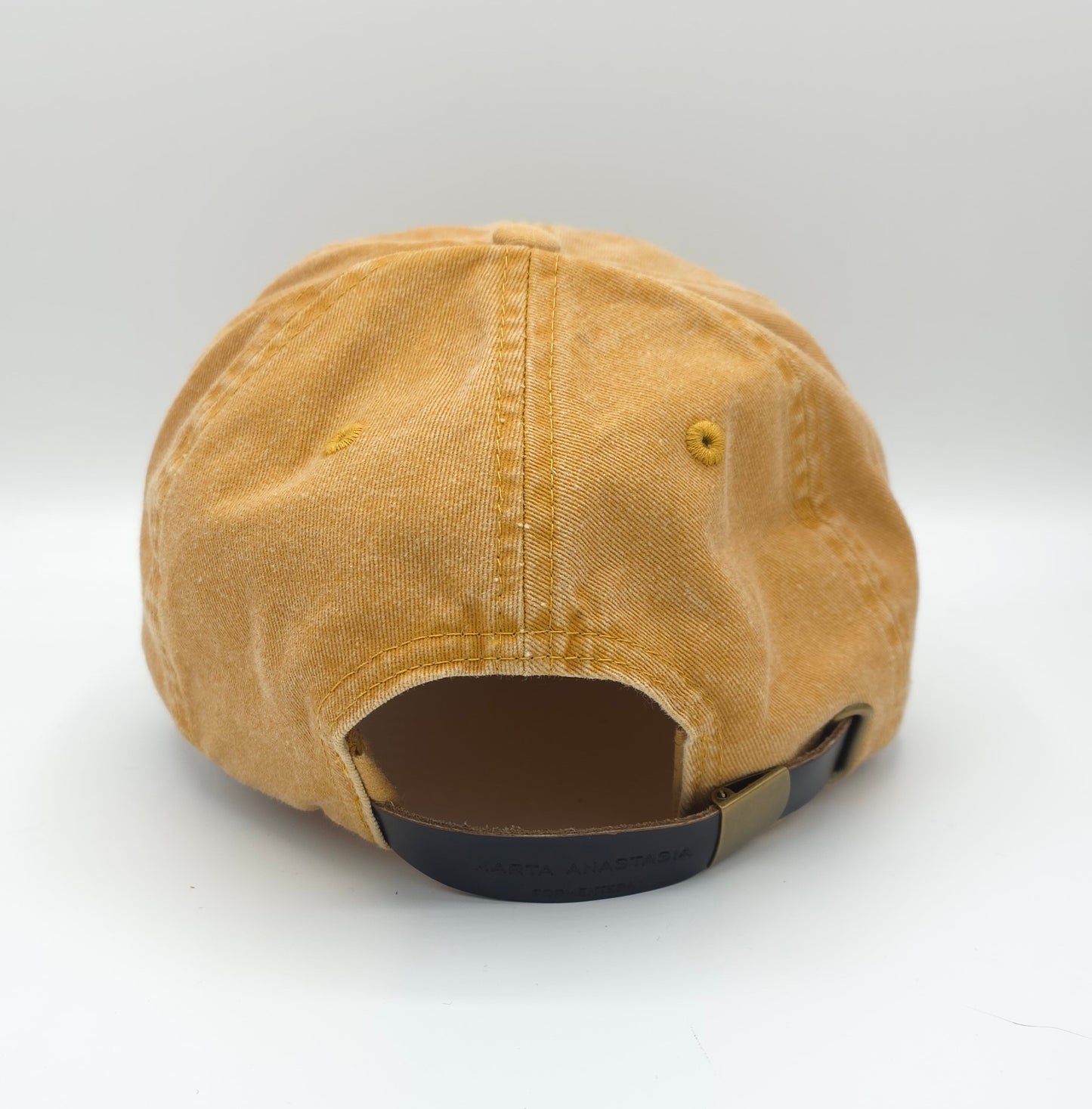 GORRA MOSTAZA CON PARCHE